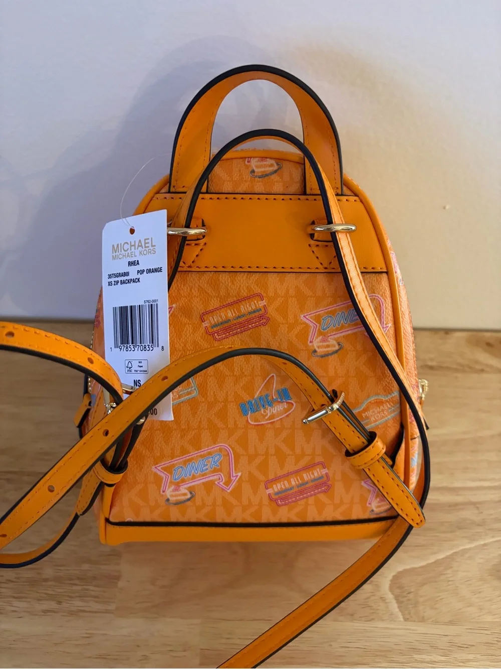 Michael Kors Orange Patterned Mini Backpack